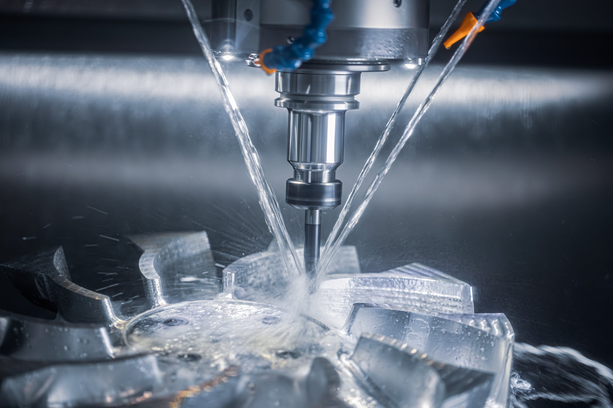 cnc-milling-machine-cutting-metal-part-with-coolant