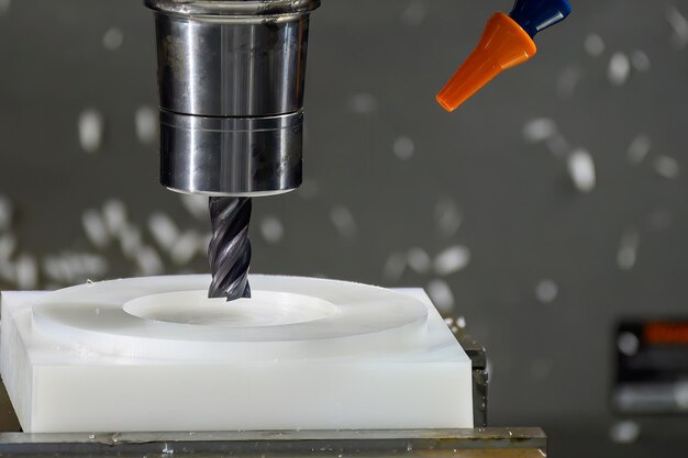cnc-milling-machine-cutting-nylon-6-material-part-with-flat-end-mill-tool-nylon-alloy-wheel-parts-cutting-process-by-machining-center-with-square-end-mill_1156970-22